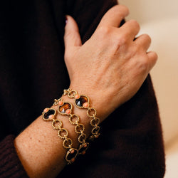 Trois bracelets BOUCHERON en or jaune et corail - Castafiore