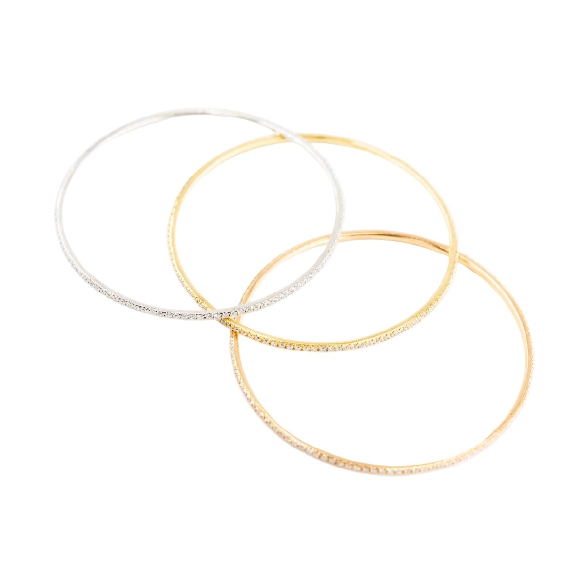 Trois bracelets Joncs en or blanc, or jaune, or rose et diamants - Castafiore