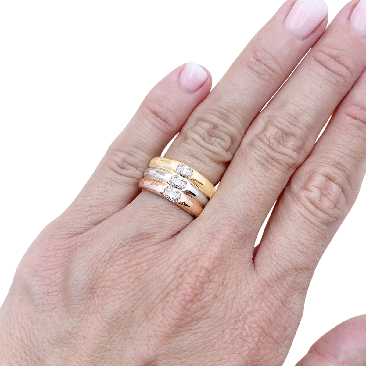 Bague Cartier, "Ellipse", trois ors et diamants.