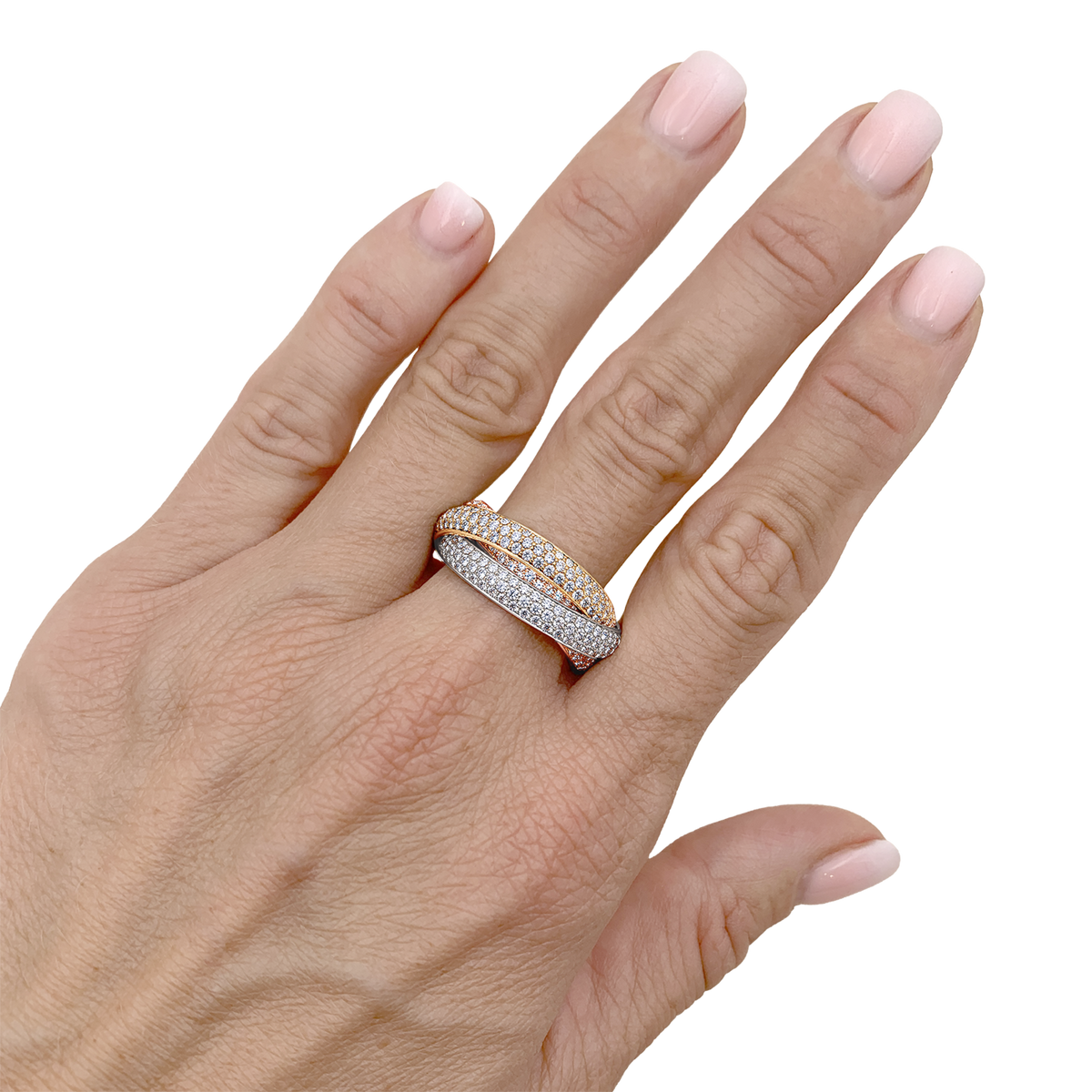Bague Cartier, « Trinity », trois anneaux trois tons d’or et diamants.