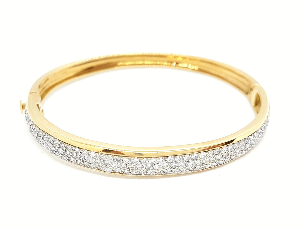 Yellow gold bangle bracelet paved with diamonds