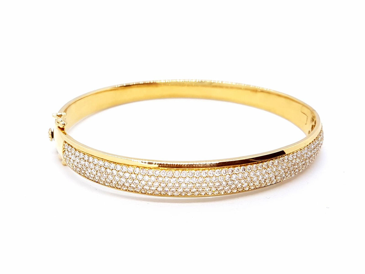 Yellow gold bangle bracelet paved with diamonds