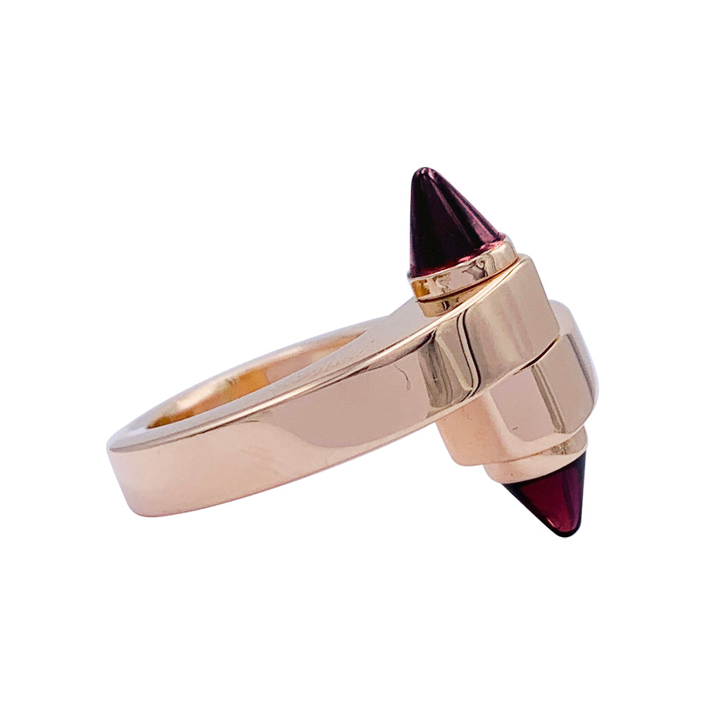 CARTIER “Menottes” ring in pink gold, rhodolite garnets