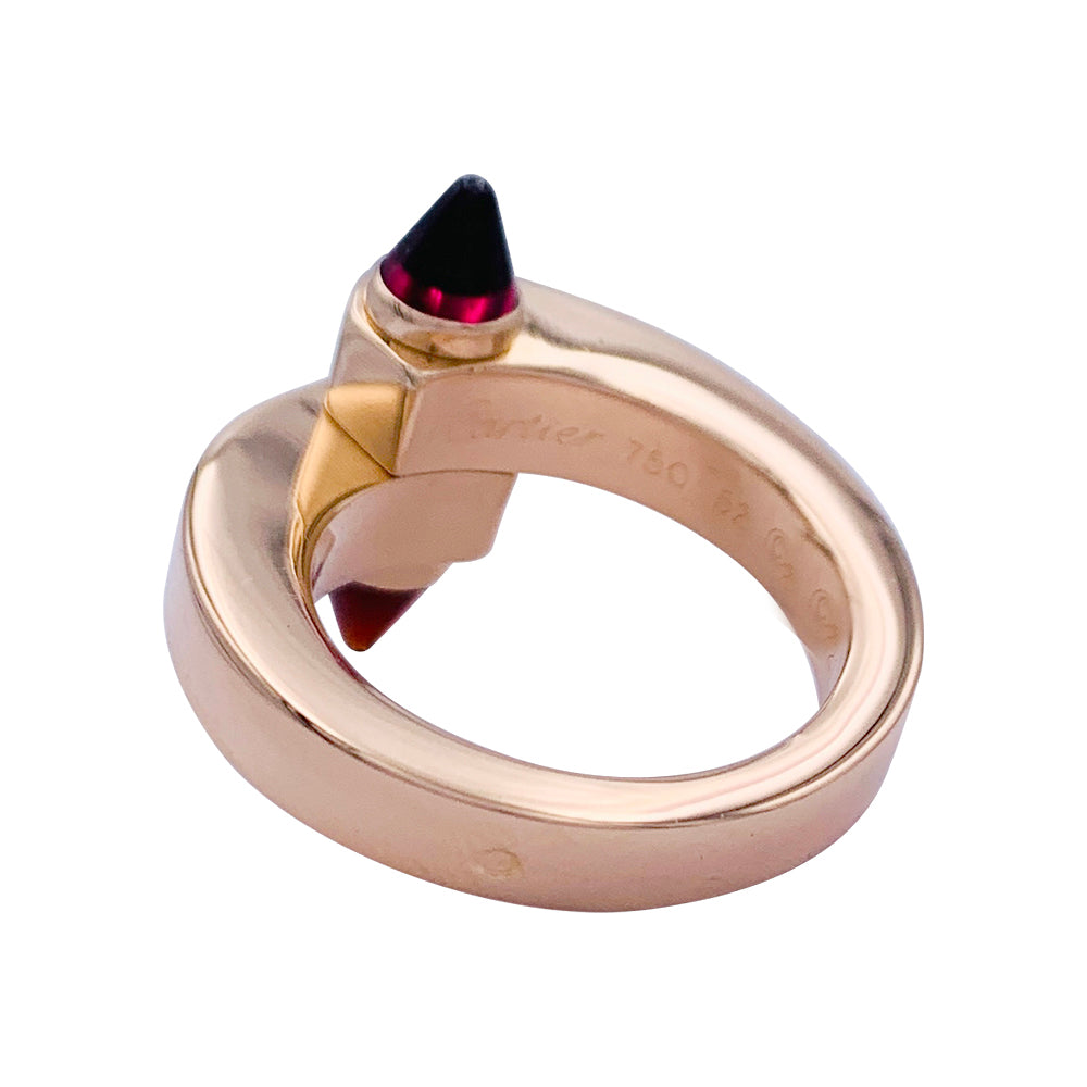 CARTIER “Menottes” ring in pink gold, rhodolite garnets