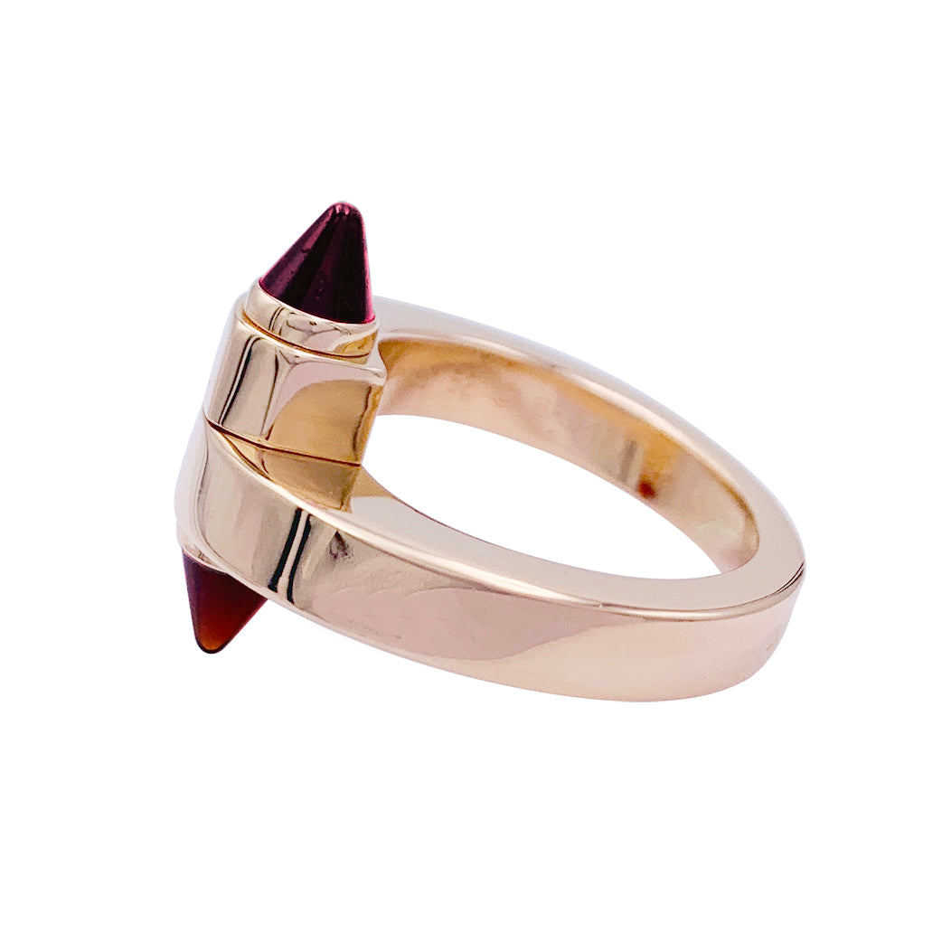 CARTIER “Menottes” ring in pink gold, rhodolite garnets