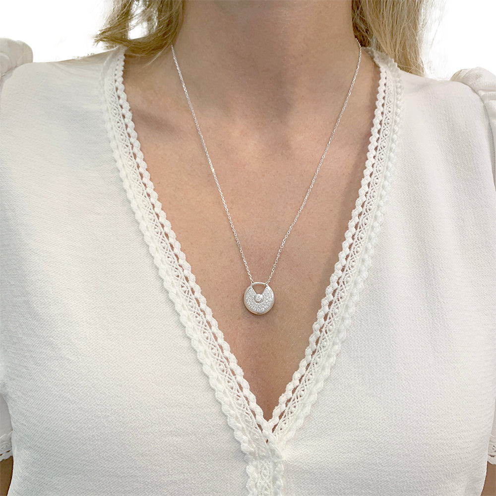 Cartier necklace, “Amulette”, white gold, diamonds.