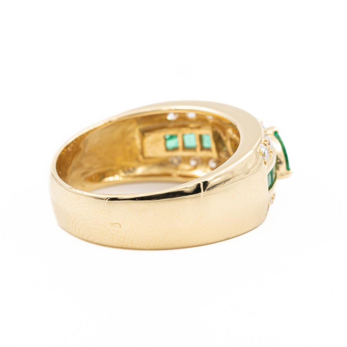 Bague Bandeau en or jaune, diamants et émeraude - Castafiore