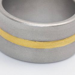 Bague Bandeau NIESSING en or jaune et acier - Castafiore