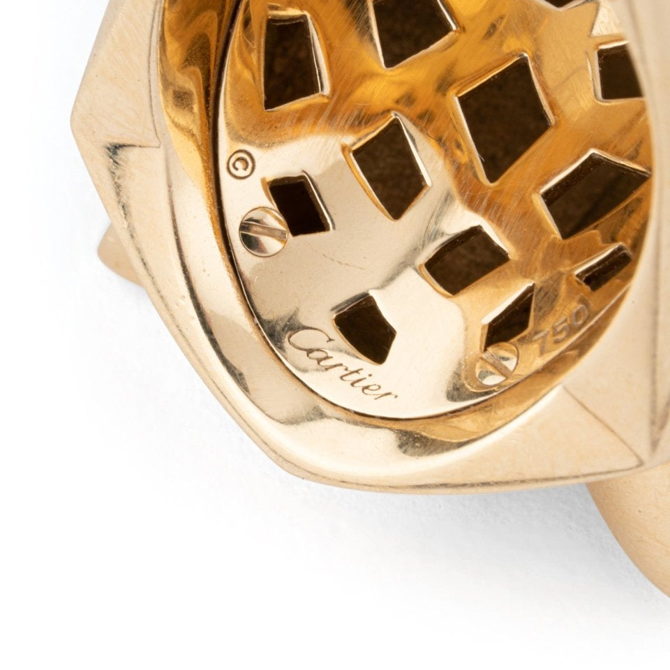 Bague CARTIER "Tête de panthère" en or jaune, laque noire, onyx et péridots - Castafiore