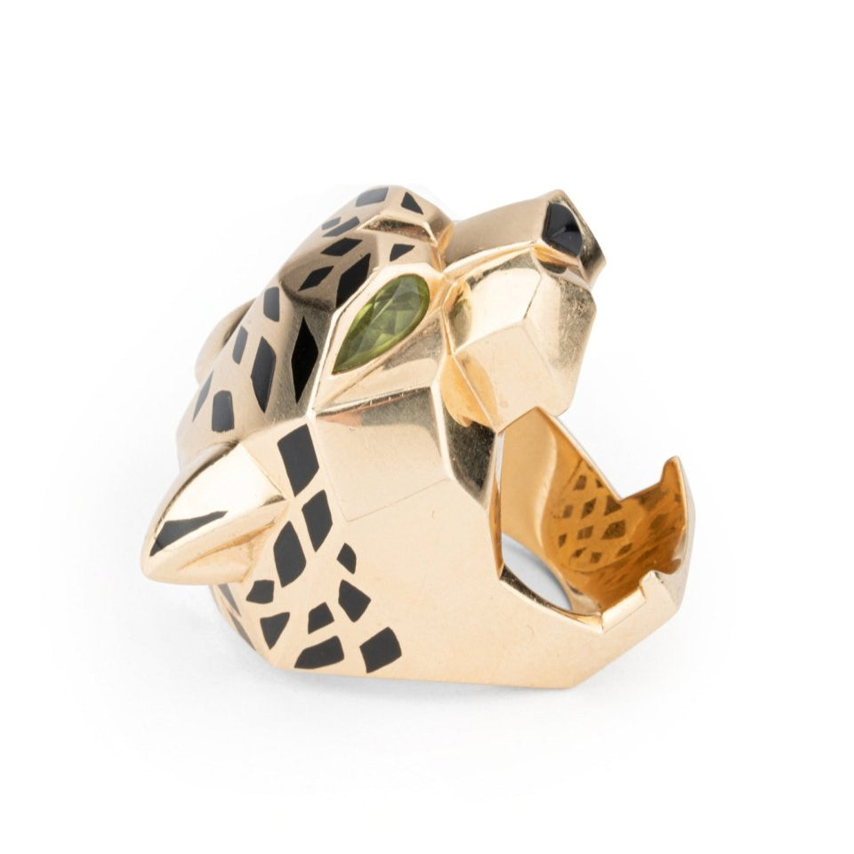Bague CARTIER "Tête de panthère" en or jaune, laque noire, onyx et péridots - Castafiore
