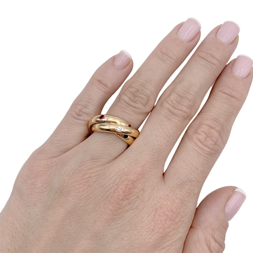 Bague CARTIER"Constellation"en or jaune saphirs, rubis et diamants - Castafiore
