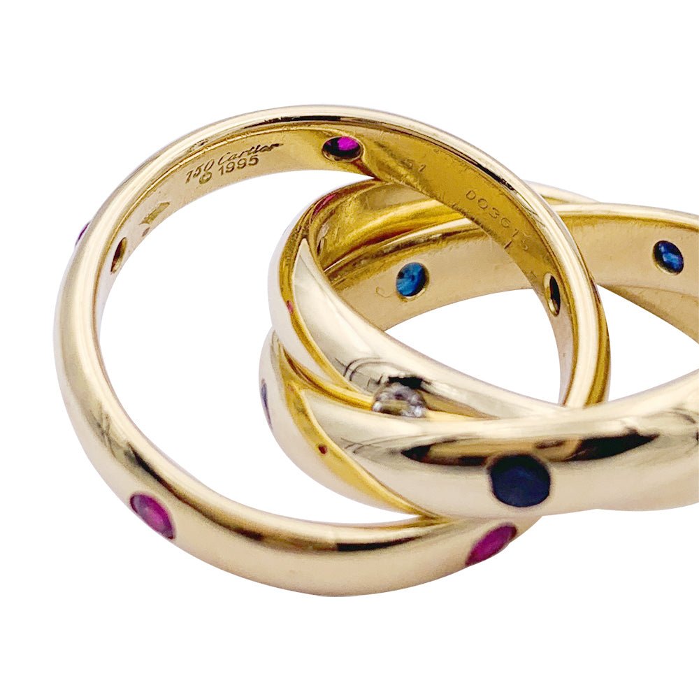 Bague CARTIER"Constellation"en or jaune saphirs, rubis et diamants - Castafiore