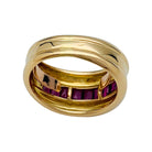 Bague Cartier,"Odin", or jaune, rubis calibrés - Castafiore