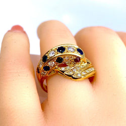 Bague dauphin en or jaune 18 carats ,saphirs ,diamants et rubis - Castafiore