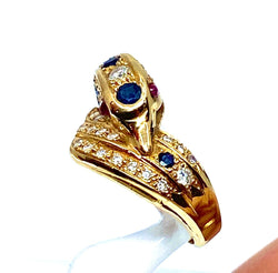 Bague dauphin en or jaune 18 carats ,saphirs ,diamants et rubis - Castafiore