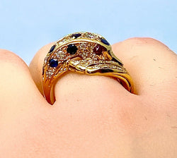 Bague dauphin en or jaune 18 carats ,saphirs ,diamants et rubis - Castafiore