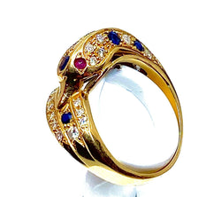 Bague dauphin en or jaune 18 carats ,saphirs ,diamants et rubis - Castafiore