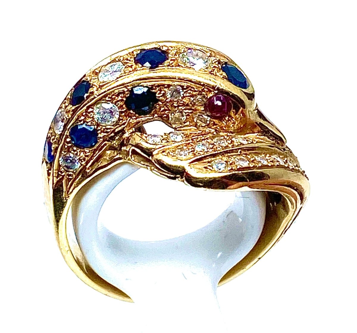 Bague dauphin en or jaune 18 carats ,saphirs ,diamants et rubis - Castafiore