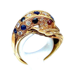 Bague dauphin en or jaune 18 carats ,saphirs ,diamants et rubis - Castafiore