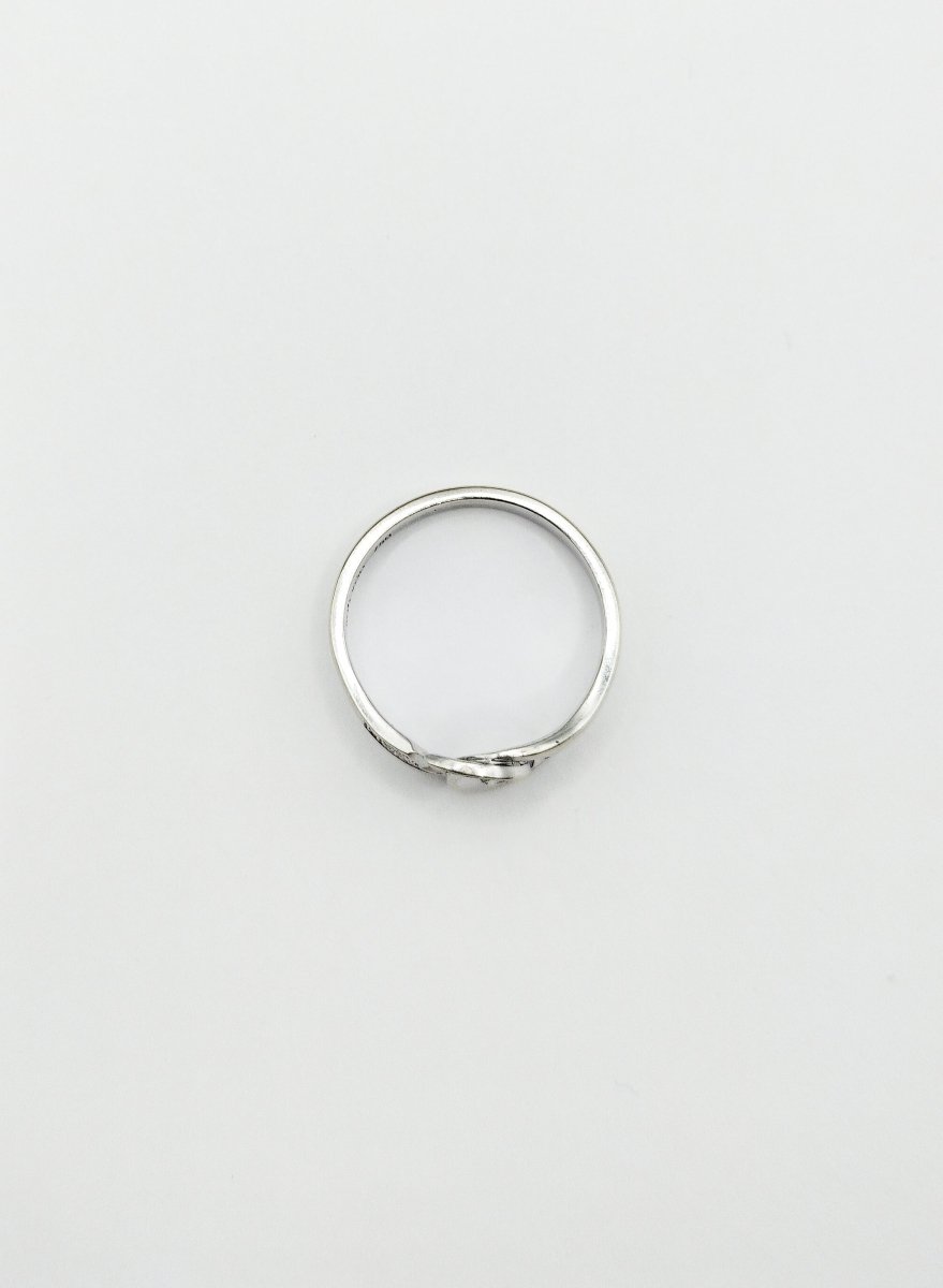 Bague DINH VAN "Menottes R8" en or blanc et diamants - Castafiore