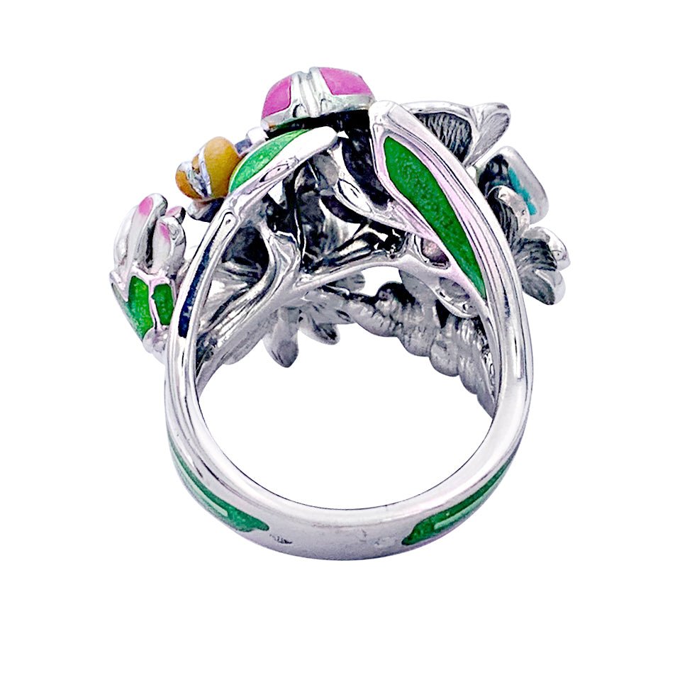 Bague DIOR "Diorette" en or blanc, émail, aigue-marine et diamant. - Castafiore