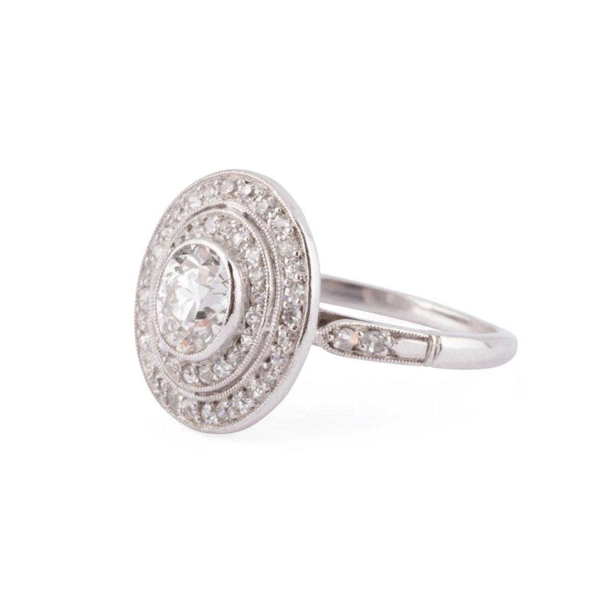 Bague double entourage en platine et diamants - Castafiore