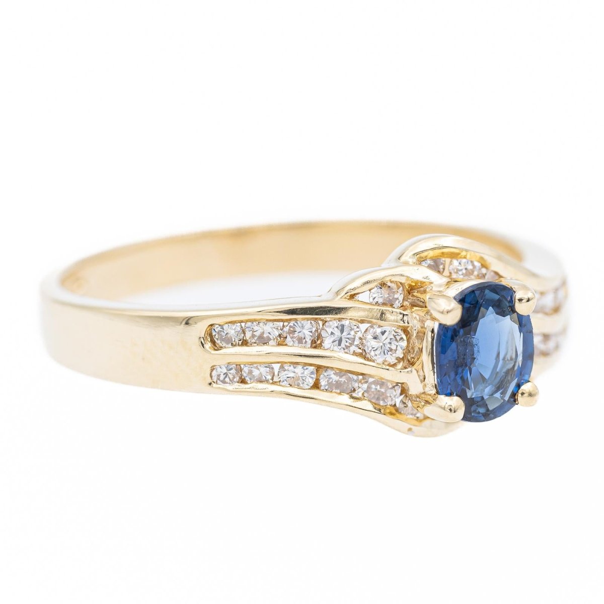 Bague en or jaune, diamants et saphir - Castafiore