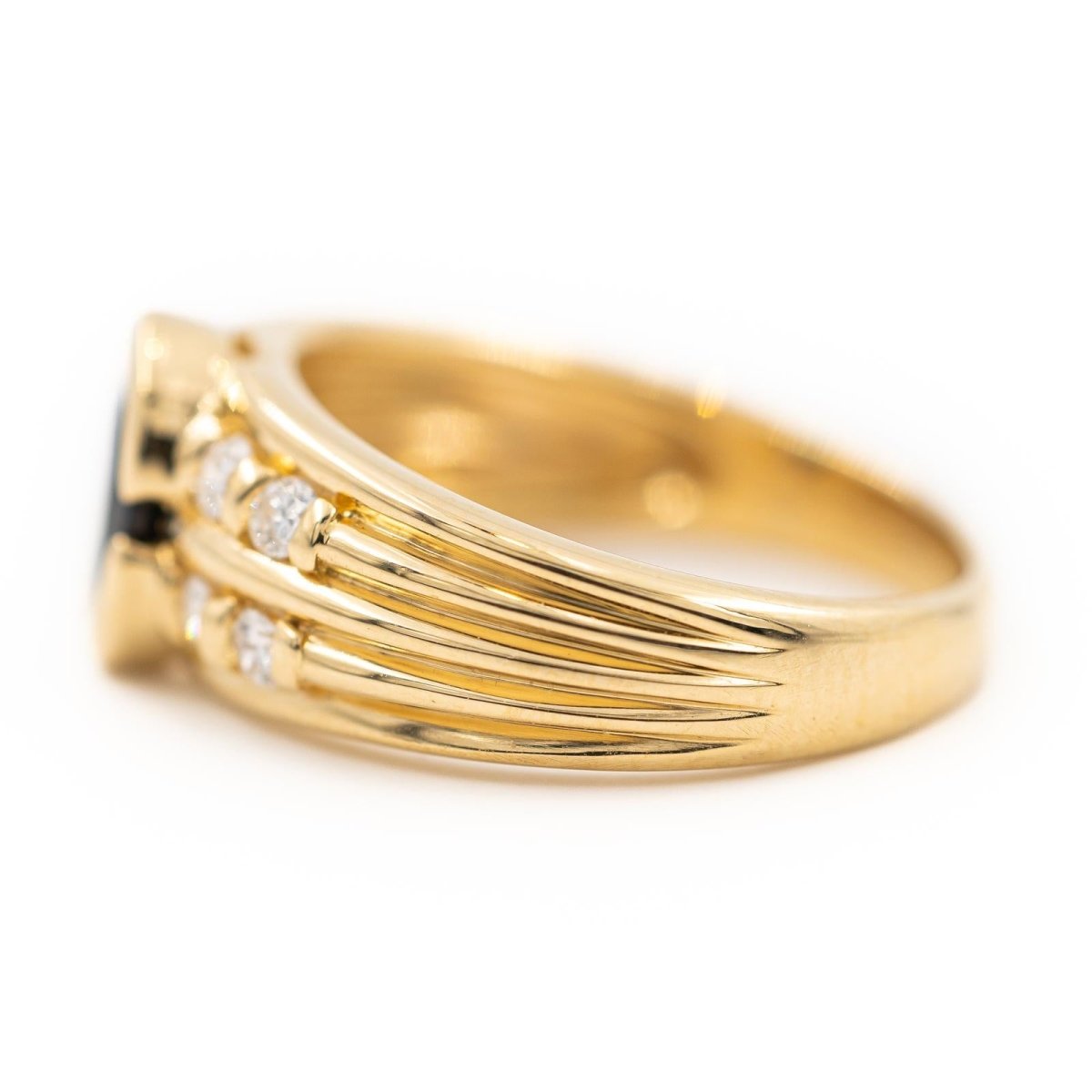 Bague en or jaune, diamants et saphir - Castafiore