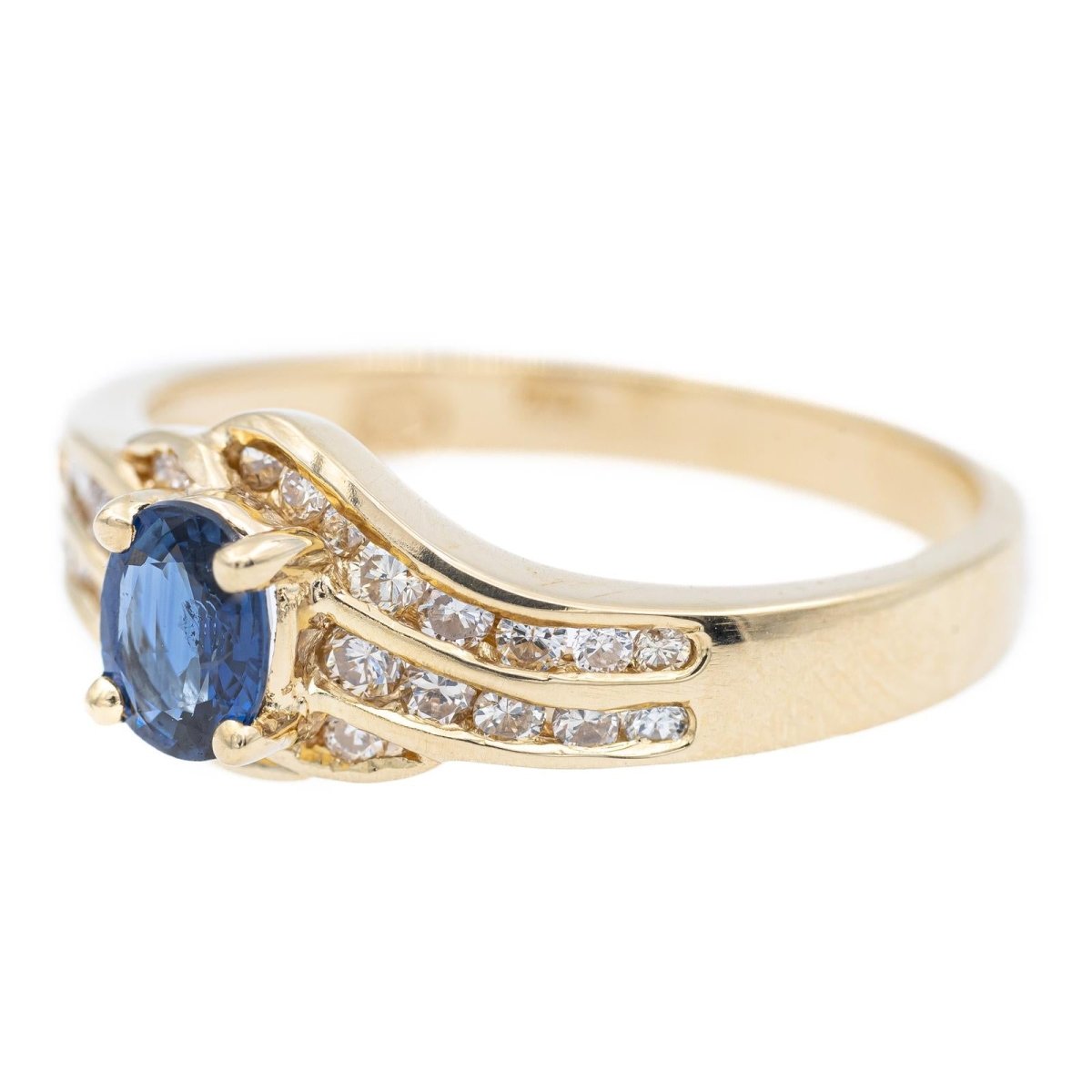 Bague en or jaune, diamants et saphir - Castafiore