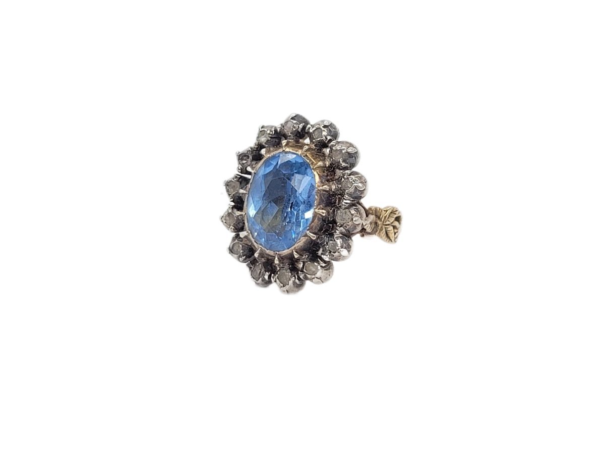 Bague Entourage en or jaune, argent, topaze et diamants - Castafiore