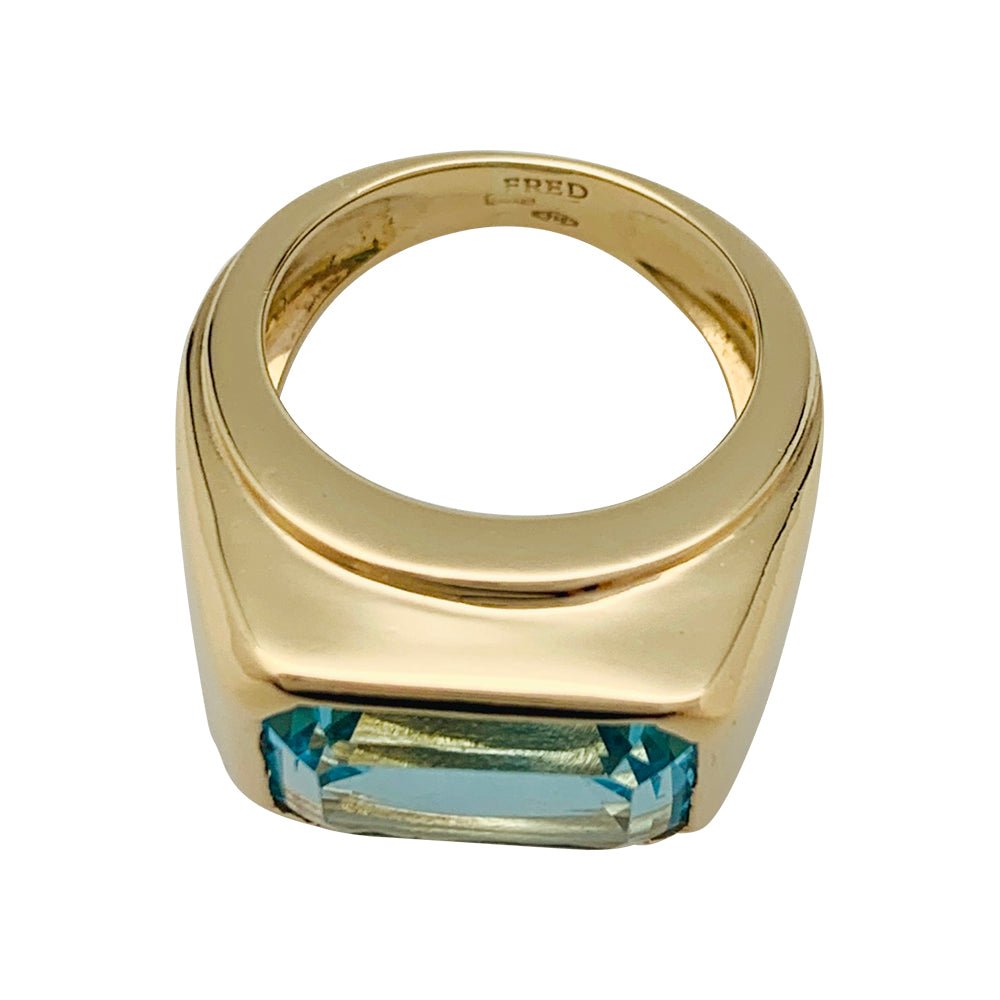 Bague Fred or jaune et topaze bleue. - Castafiore