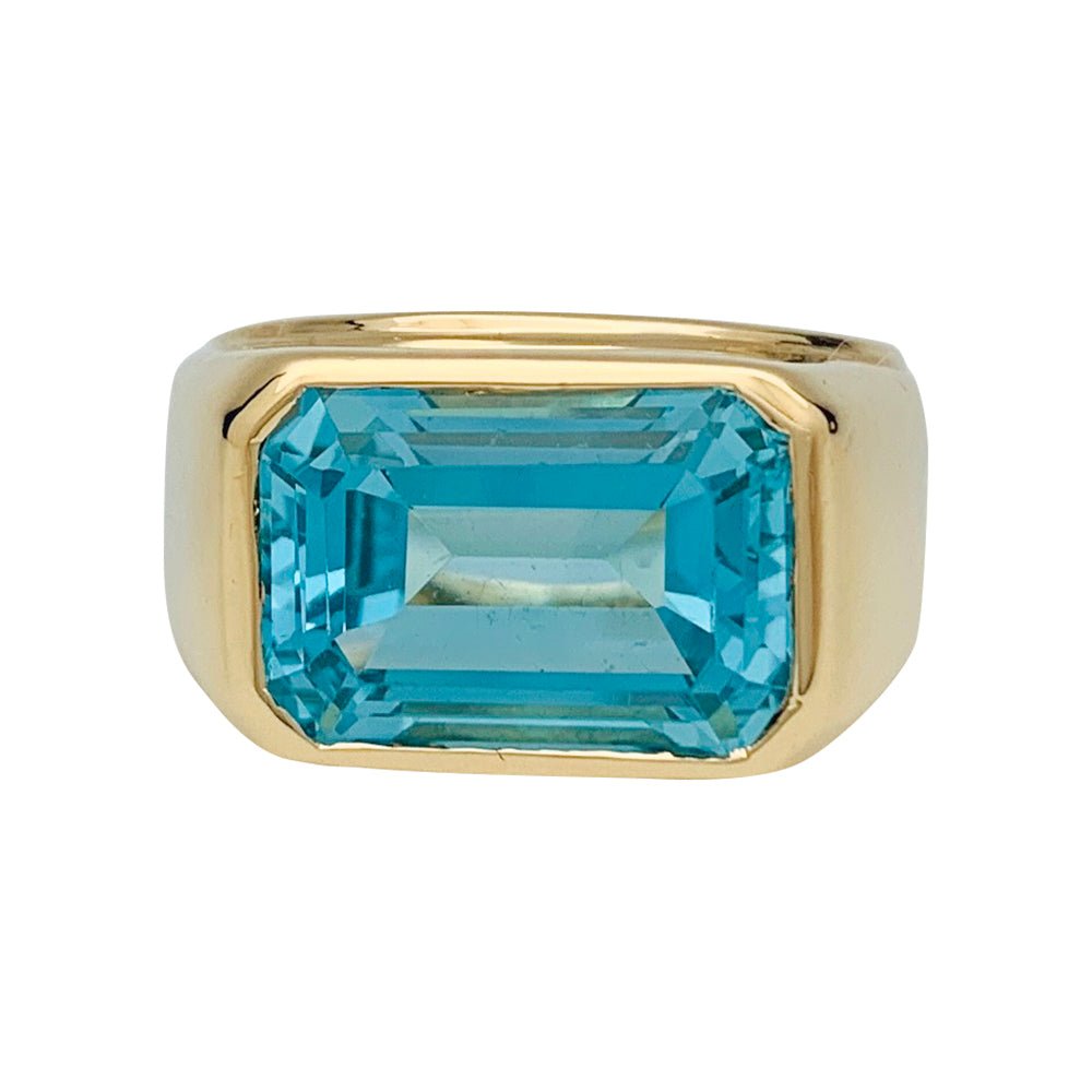 Bague Fred or jaune et topaze bleue. - Castafiore