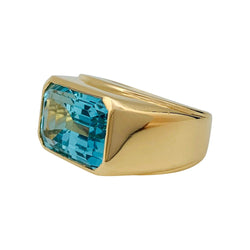 Bague Fred or jaune et topaze bleue. - Castafiore