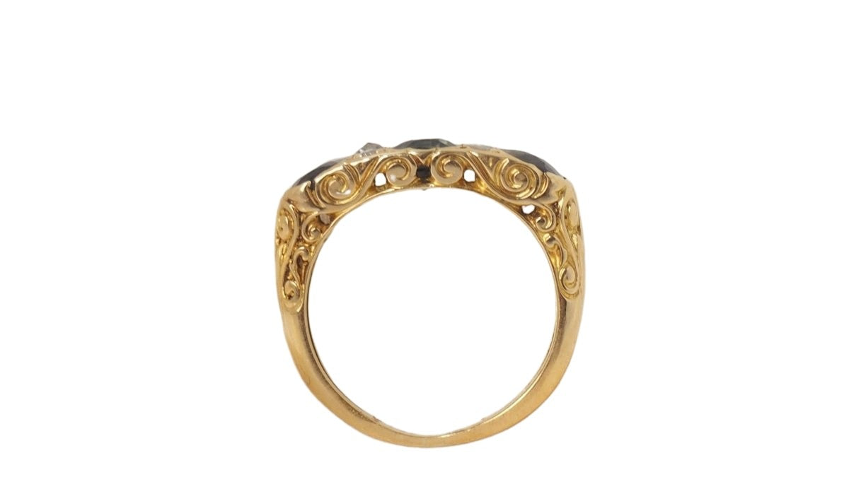 Bague jarretière en or jaune, saphirs et diamants - Castafiore