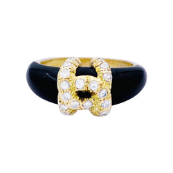 Bague Jonc CARTIER "Double C" en or jaune, onyx et diamants - Castafiore