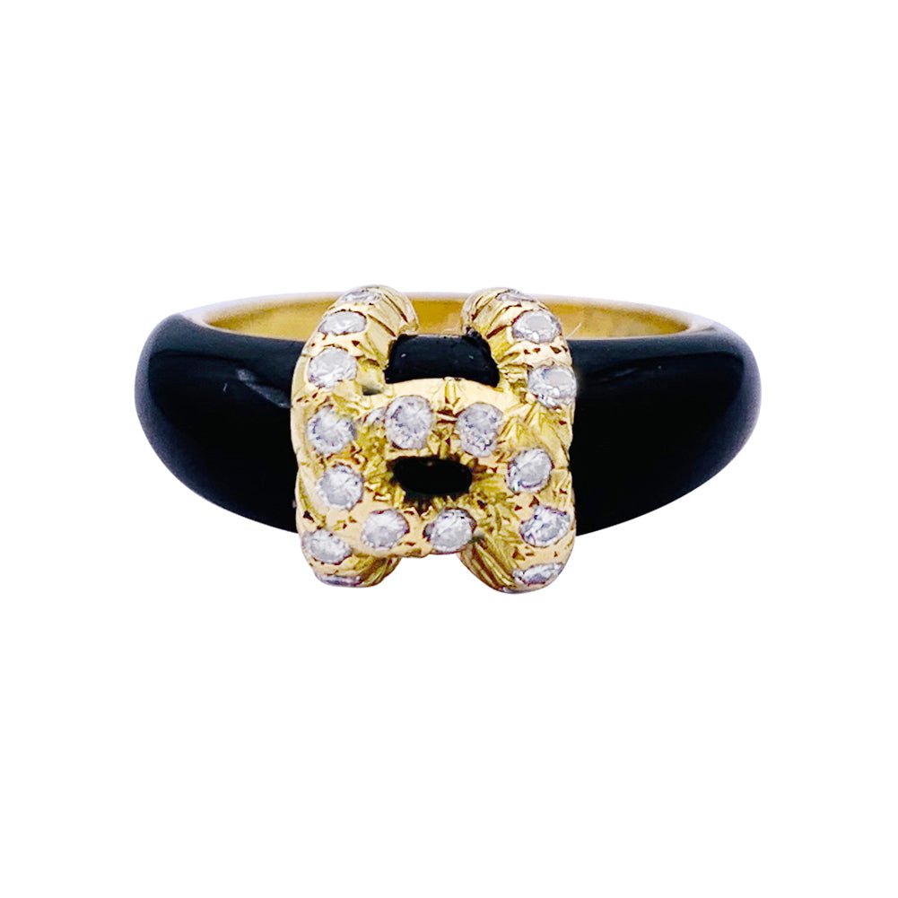 Bague Jonc CARTIER "Double C" en or jaune, onyx et diamants - Castafiore