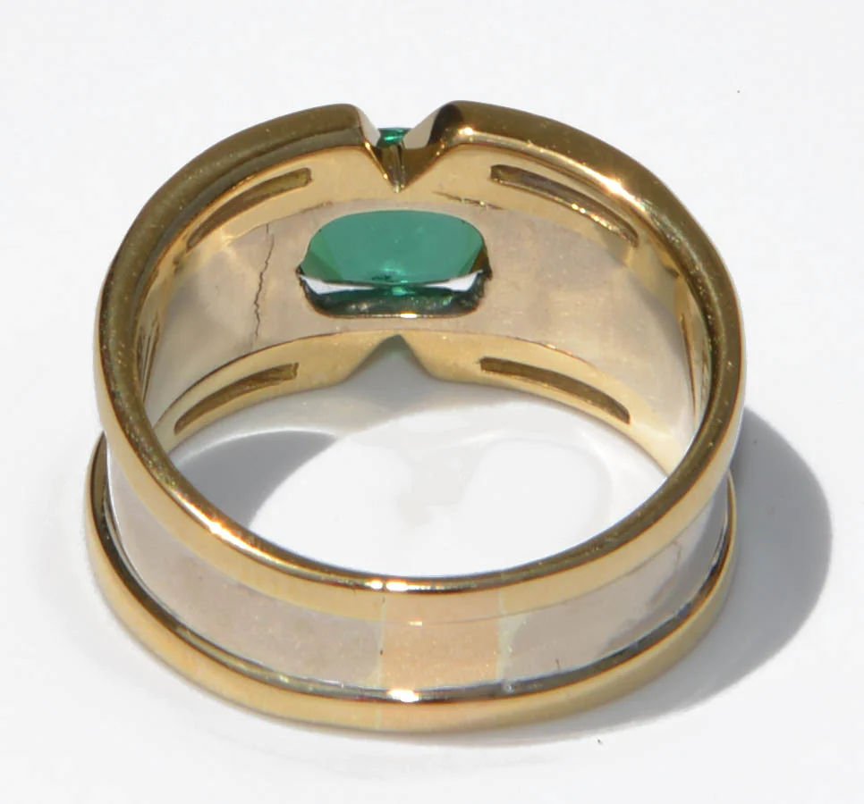 Bague jonc en or jaune ornée d'une Tourmaline sur une descente de diamant baguette - Castafiore