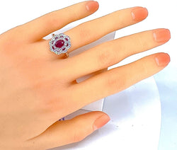 Bague marguerite en or blanc 18 carats en rubis et diamants - Castafiore