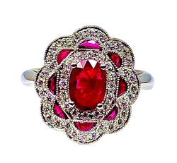 Bague marguerite en or blanc 18 carats en rubis et diamants - Castafiore