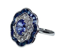 Bague marguerite en or blanc 18 carats en saphirs et diamants - Castafiore