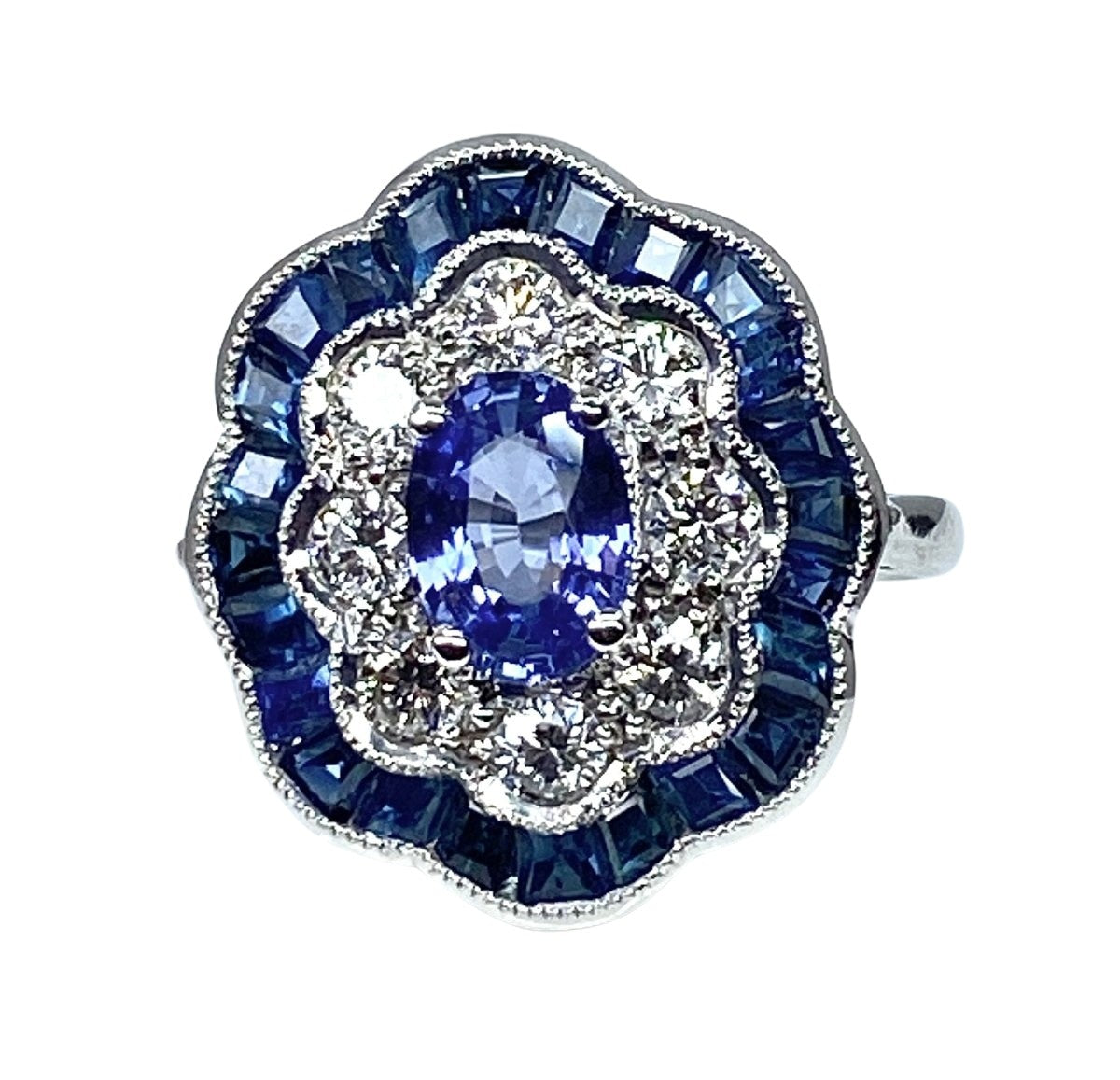 Bague marguerite en or blanc 18 carats en saphirs et diamants - Castafiore