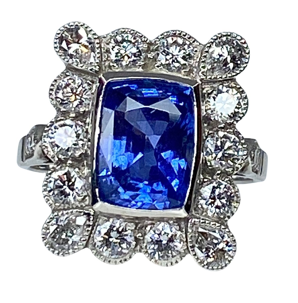 Bague Marguerite en or blanc saphir et diamants - Castafiore