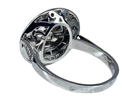 Bague Marguerite ronde en or blanc, saphirs et diamants - Castafiore