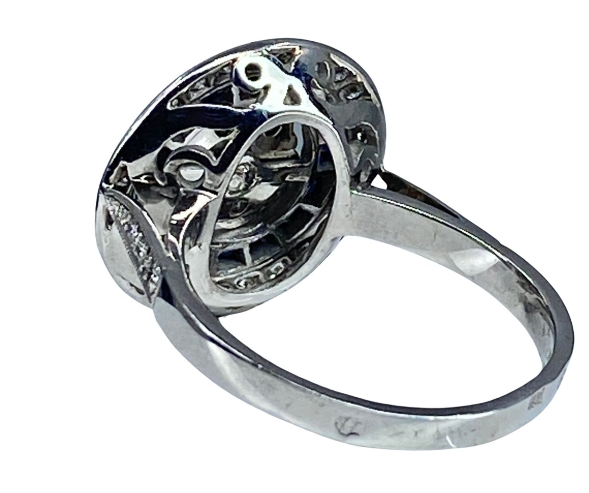 Bague Marguerite ronde en or blanc, saphirs et diamants - Castafiore