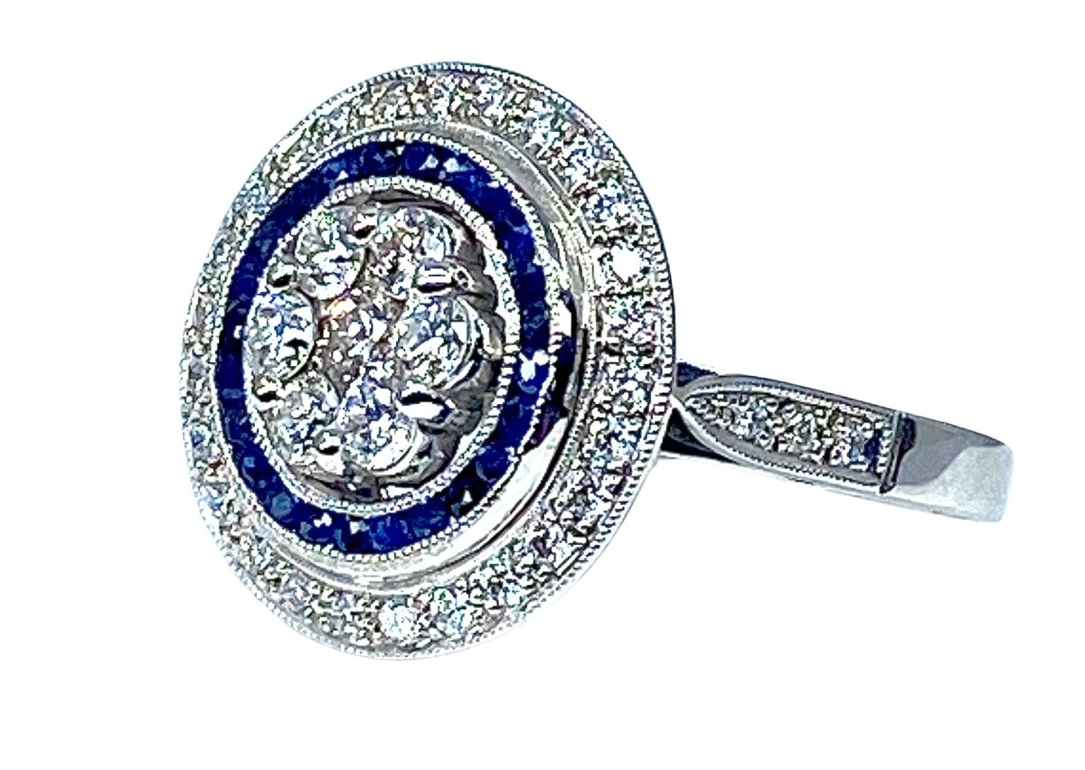 Bague Marguerite ronde en or blanc, saphirs et diamants - Castafiore