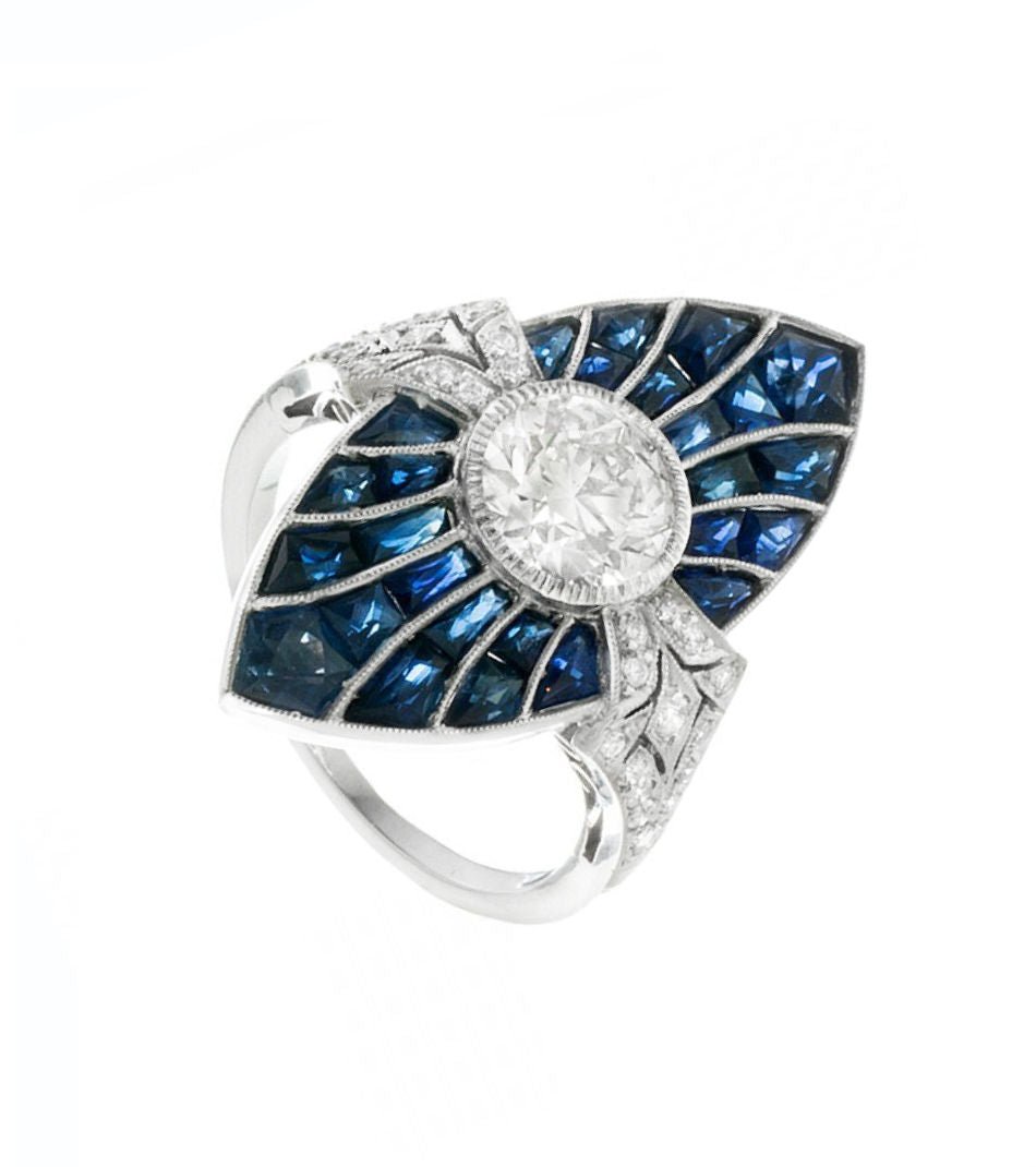 Bague Marquise en platine, saphirs et diamants - Castafiore