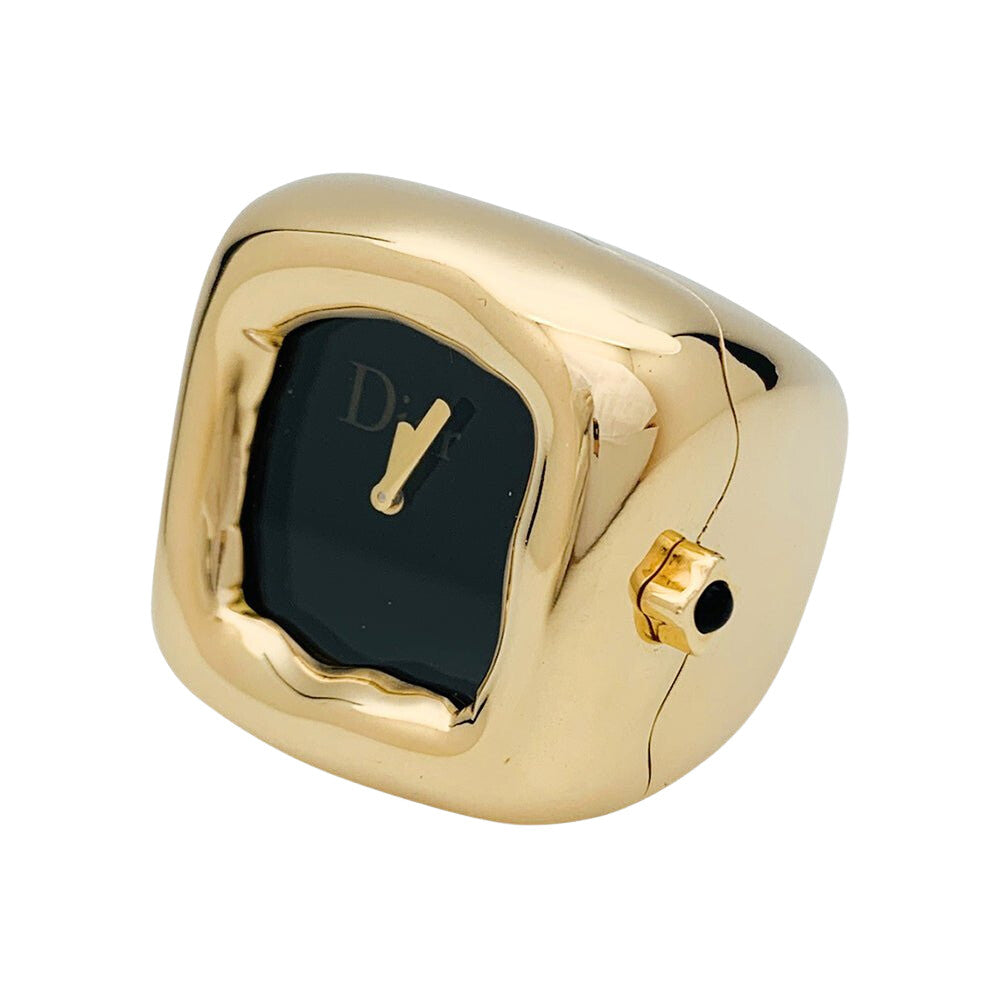 Bague montre Dior, modèle "Nougat", en or jaune et onyx - Castafiore