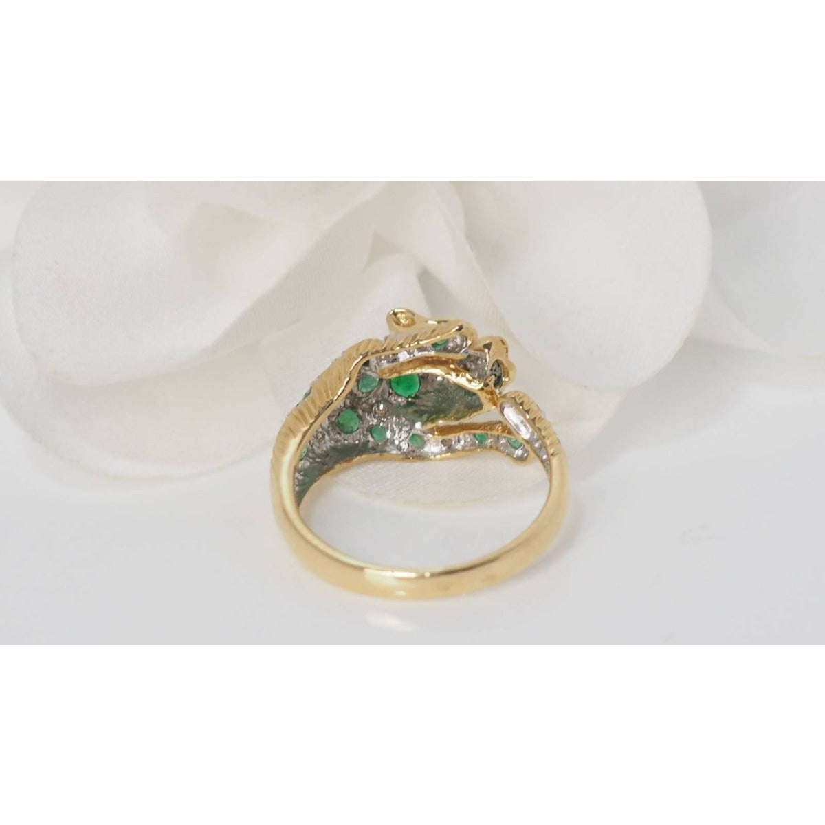 Bague panthère en or jaune, émeraudes et diamants - Castafiore