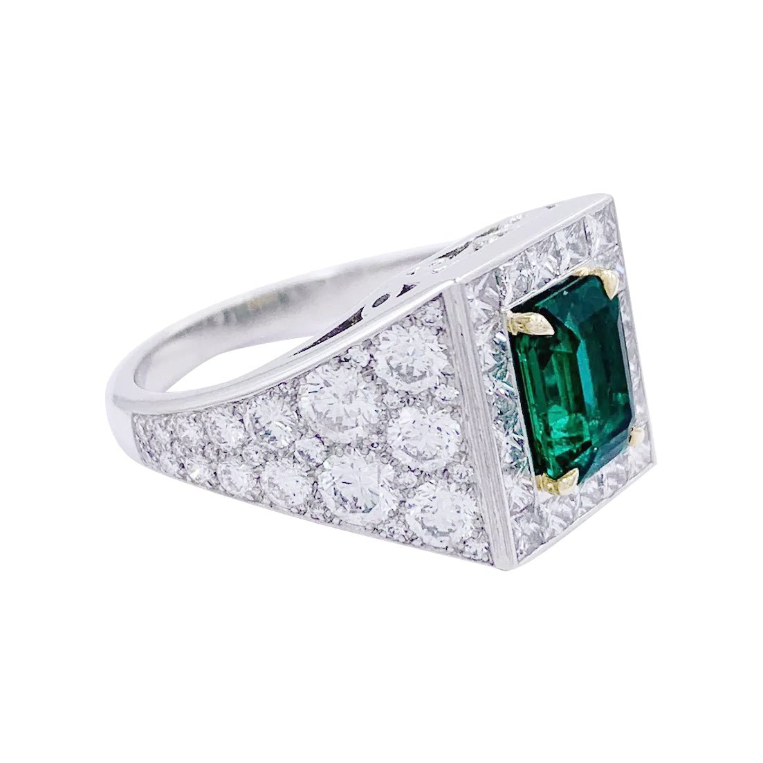 Bague, platine, or jaune, émeraude et diamant - Castafiore