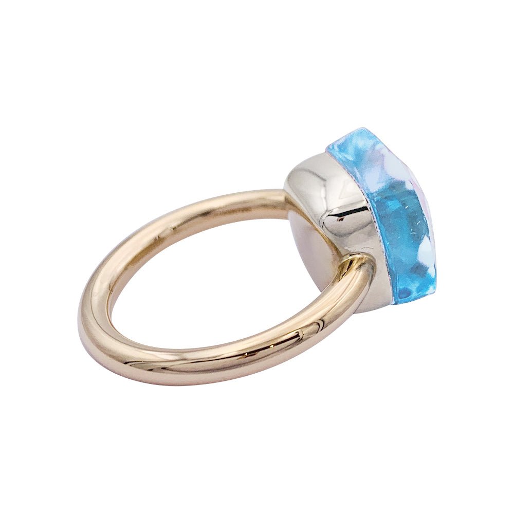 Bague Pomellato, "Nudo Maxi", deux ors et topaze bleue. - Castafiore